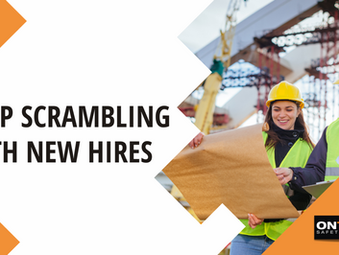 A safety supervisor reviews orientation materials with a new worker on a jobsite. Both are wearing PPE and looking at a safety checklist, symbolizing structured onboarding and training.