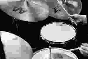 <img src="drums" alt="person playing drums">