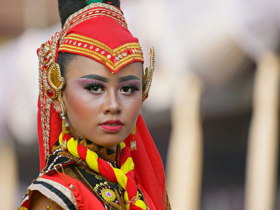 Participant in elaborate costume at Jember Fashion Carnaval, East Java, Indonesia