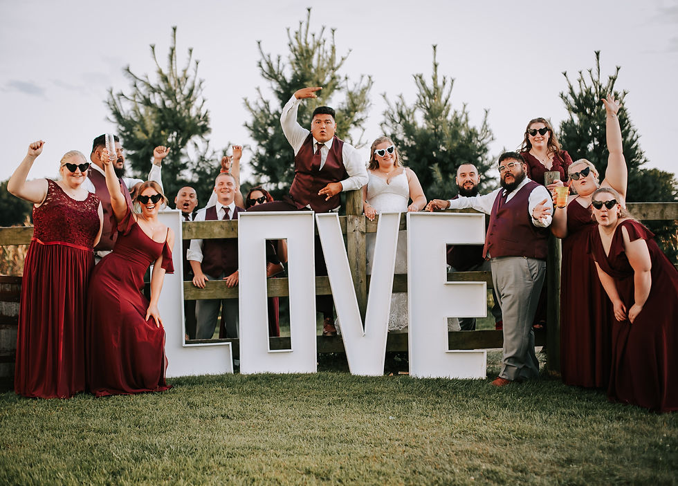 A colorful and vibrant photo backdrop for guests to take pictures.