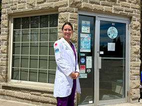 Doctor standing outside clinic