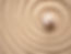 Shell in circles on the sand. Zen concept. Spiral in the sand.jpg