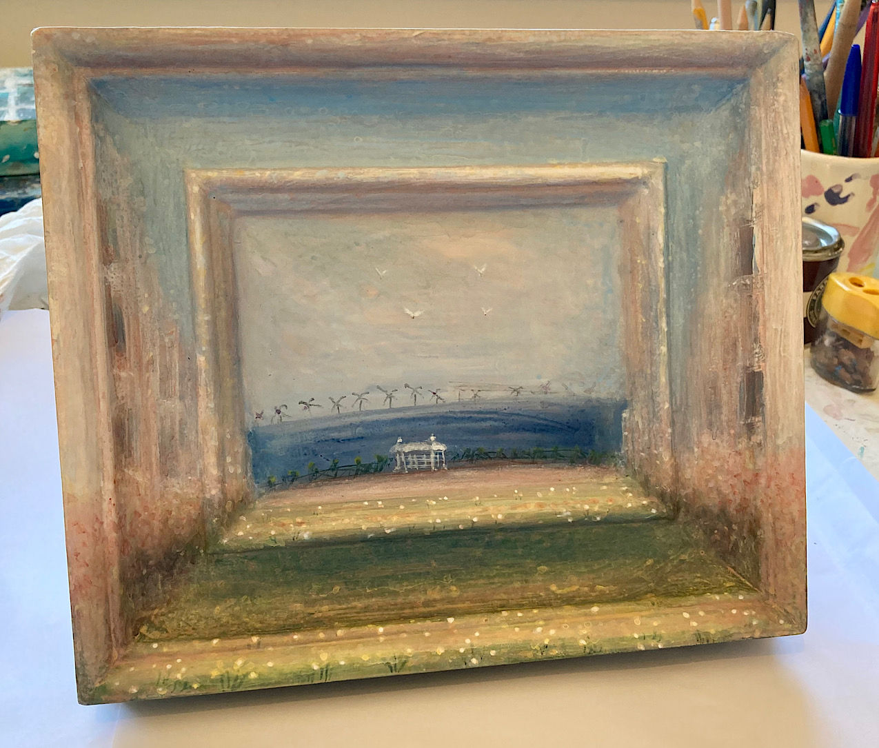 seascape with a difference a view of Hove seafront through Medina terrace to the promenade and the Rampion wind Farm