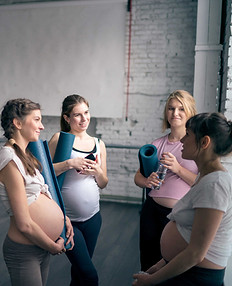 Pregnant Women in Yoga Class_edited.jpg
