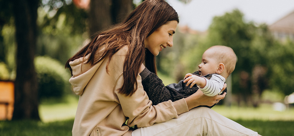 mother-with-her-little-son-park-sitting-grass.jpg