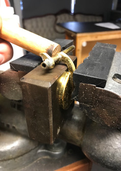 Straightening sax keys
