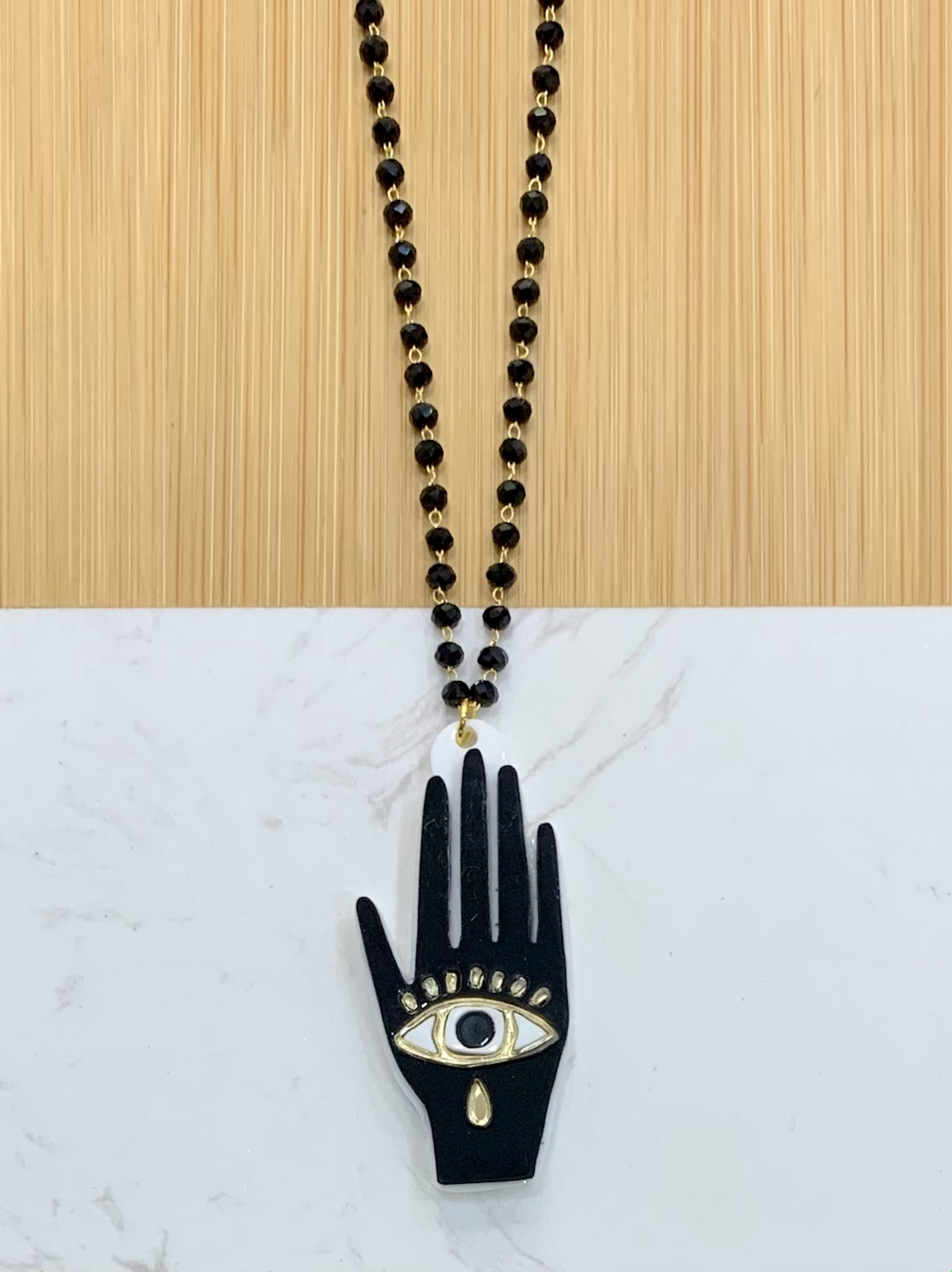 Hamsa eye necklace