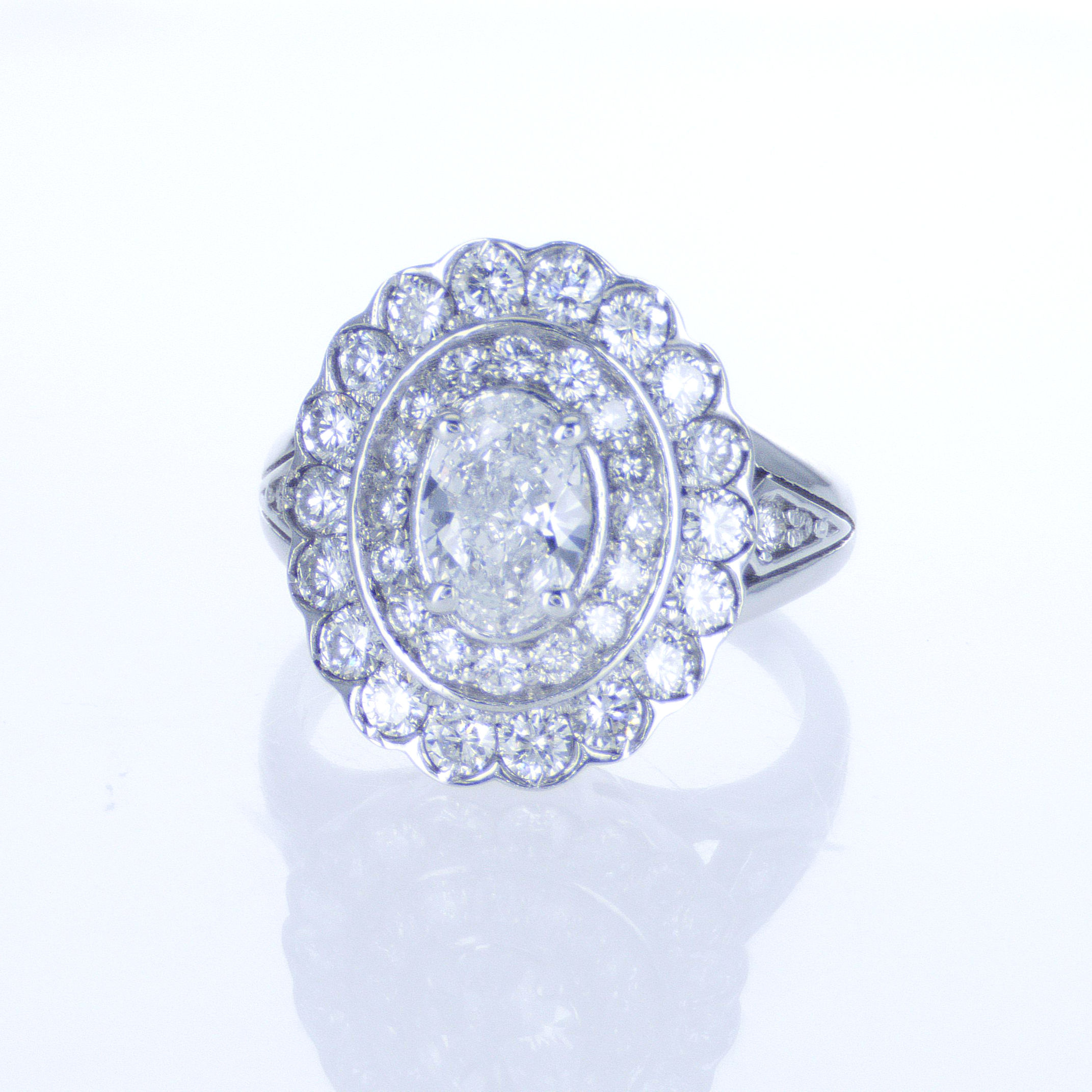 Inspired Oval Halo Diamond Engagement