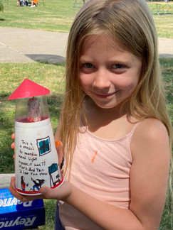 Girl with lighthouse craft