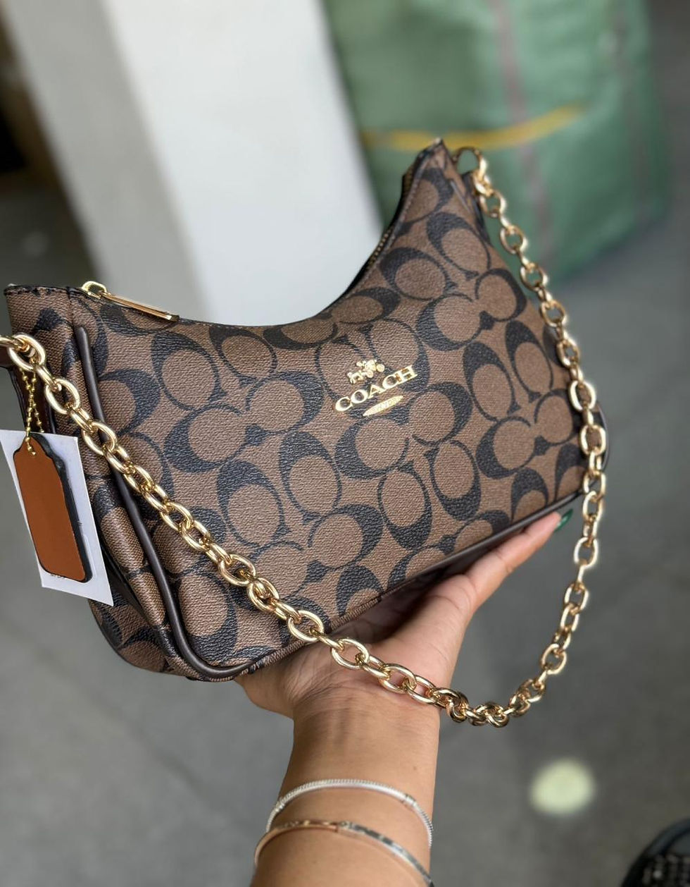 Miniatura: COACH TERI