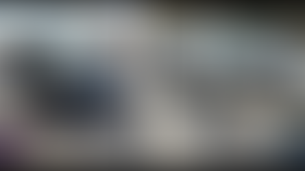 Two vehicles with collision damage on a street: a black truck and a silver car. Logos for Watertown Police and Fire Rescue visible.