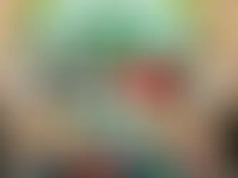 Adults and children proudly hold certificates and plaques in front of a green 4-H banner. Joyful group setting with visible "Northeast Radio SD" logo.