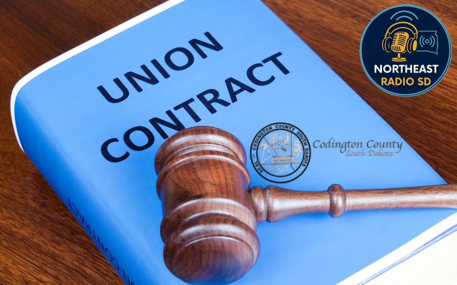 Blue book titled "Union Contract" with a wooden gavel on top, Codington County seal, and Northeast Radio SD logo in the background.