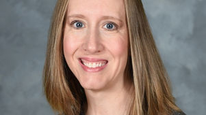 Portrait of a smiling woman on a chalkboard-style History graphic with The Gilder Lehrman Institute of American History and Northeast Radio SD text