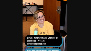 Smiling woman in yellow shirt at microphone during live Watertown Chamber of Commerce stream, with Northeast Radio SD banner.