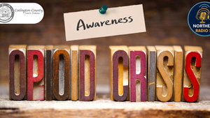 Wooden blocks spell "OPIOID CRISIS" with a paper reading "Awareness" above. Logos for Codington County and Northeast Radio SD are visible.