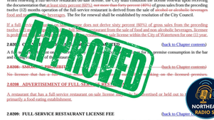 Text document with sections crossed out in red. Large green "APPROVED" stamp overlaid. Logo in bottom right corner.