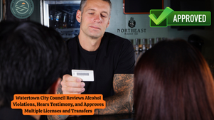 Man examines an ID card at a bar; backdrop has logos, a green "Approved" checkmark, and text on council meeting about licenses.