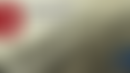 Close-up of a report card with text about South Dakota's record-high graduation rate. Includes red flame logo and radio badge.