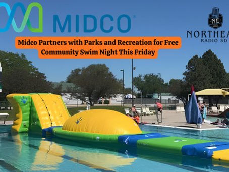 Pool with inflatable obstacle and swimmers; banner reads Midco partners with Parks and Recreation for Free Community Swim Night Friday.