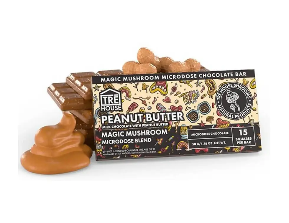 Chocolate bar package labeled "TRE House Peanut Butter" with colorful illustrations. Chocolate squares and a swirl of peanut butter are visible.