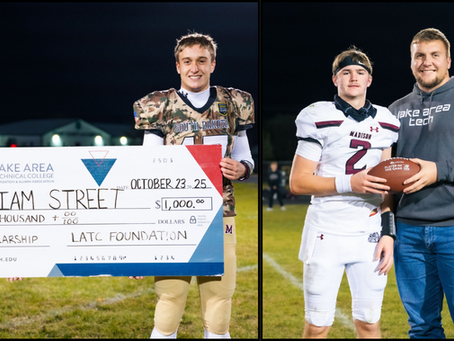 Two football players on a field, one holding a scholarship check, the other with a football. Night setting, positive mood.