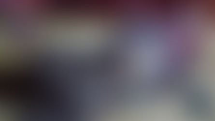 Overturned car on grass at night. Badly damaged. Watertown Fire Rescue and Northeast Radio SD logos visible.