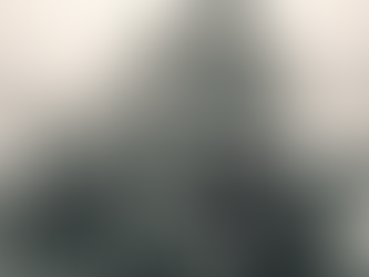 A propane truck travels on a snowy road with forests in the background. The tank is marked with "1075" and "PROPANE" signs. Gray skies above.