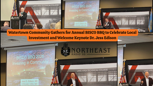 Speaker and audience at Watertown event. Screens display "BISCO BBQ 2026 Investing in Community" and "Jess D. Edison, MD." American flags in view.