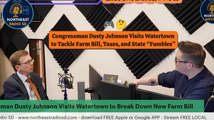Two men in a radio studio discuss the Farm Bill. Black soundproof panels and a screen on the table. "Live from Watertown SD" text.