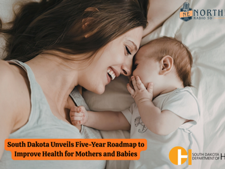 Mother and baby lying together on a bed, smiling. Text: "South Dakota Unveils Five-Year Roadmap to Improve Health for Mothers and Babies."