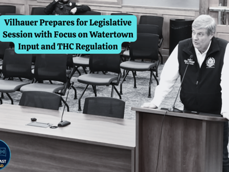 Man speaks at a podium in a meeting room with empty chairs. Text on screen: "Vilhauer Prepares for Legislative Session." Mood: formal.