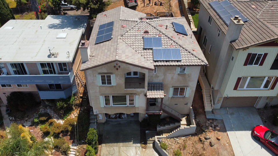 Drone photo of a clean roof, showcasing a spotless surface after professional roof cleaning services.