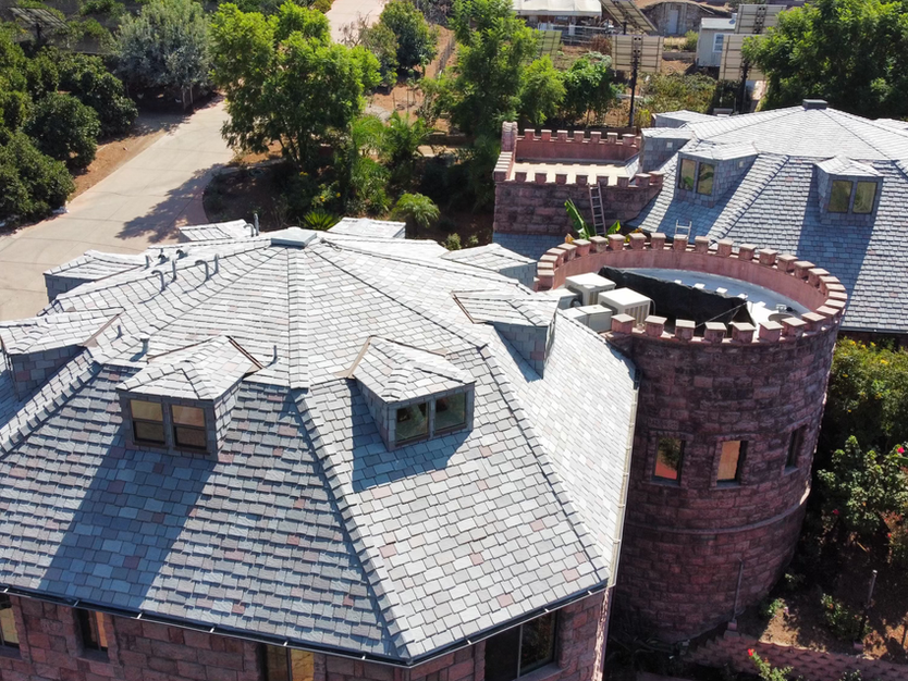 Drone photo of a clean roof, showcasing a spotless surface after professional roof cleaning services.