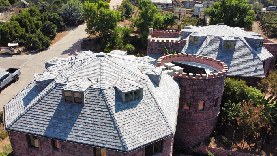 Drone photo of a clean roof, showcasing a spotless surface after professional roof cleaning services.