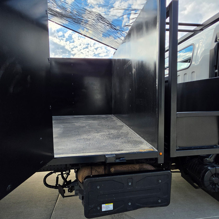 Side door access on all new steel dump bodies that are for sale at rusty rides auto sales