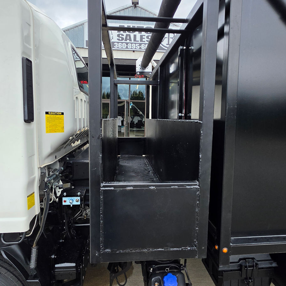 BEHIND THE CAB STORAGE ON THIS 2019 ISUZU HD DUMP TRUCK FOR SALE IN PORT ORCHARD, WA AT RUSTY RIDES AUTO SALES