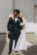 Newlywed couple posing together after intimate wedding ceremony officiated by Rooted in Love