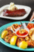 GardenGrillSamplePlatterWithBakedClamsLemonCalamariMozzarellaandTomatoes.jpg