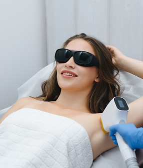 laser epilation, hair removal procedure, young beautiful caucasian smiling brunette woman