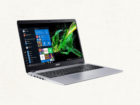 Acer Aspire 5 Slim Laptop with open screen displaying Windows 10 desktop on a light background. Caption: Stay productive this summer with the Acer Aspire 5 Slim—lightweight, reliable, and perfect for everyday tasks.