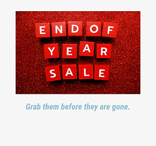 A red sign with END OF YEAR SALE on it.