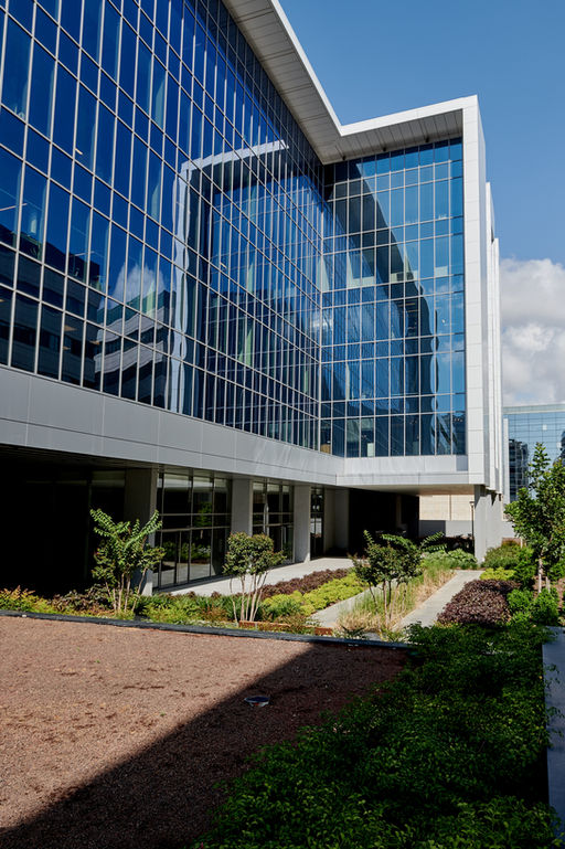 Modern office building exterior with landscaping