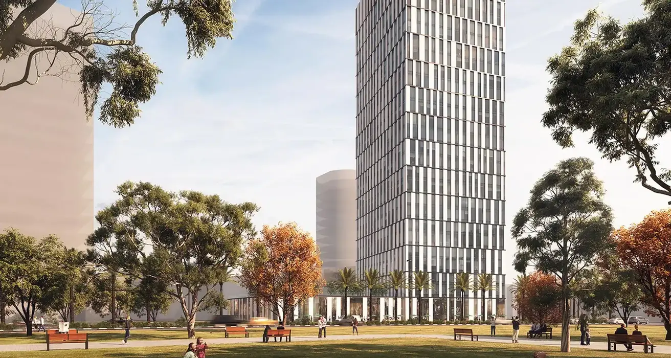 Modern high-rise building beside a park