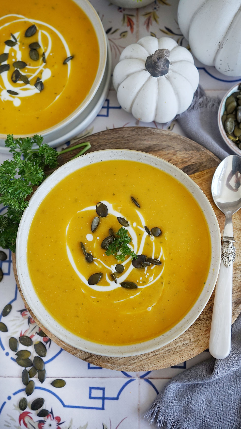 Eye-level view of a pot of creamy butternut squash soup on the stovetop