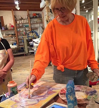 mary painting tiles.JPG