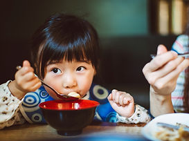 Little Girl in a Restaurant