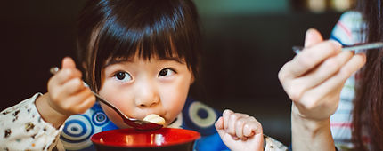 Little Girl in a Restaurant