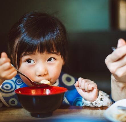 Little Girl in a Restaurant
