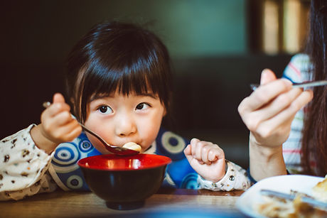 Little Girl in a Restaurant